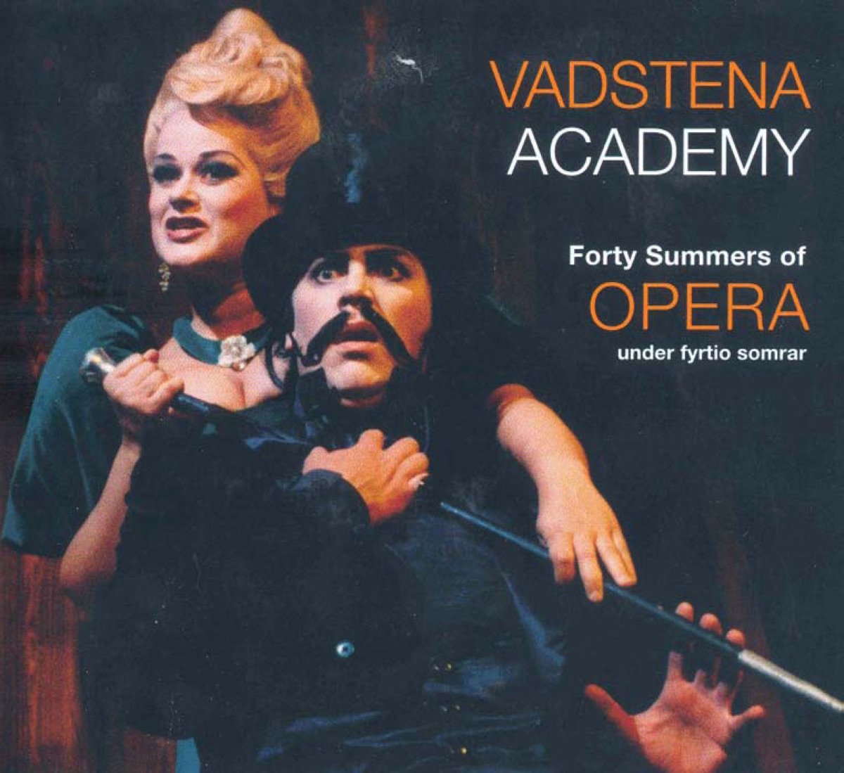 Vadstena Academy: 40 Summers of Opera by Jadwiga Koba, Lilian Sjostrand, Sven-Anders Benktsson, Vadstena Academy, Arnold Ostman, Birgitta Kallenberg, Gunilla Soderstrom, Helge Lannerback, Elisabeth Ander, Torbjorn Lillieqvist, Eva Bostrom, Ulrik Soelberg, Jan Nessler, Helena Döse, Louise Werner, Christer Solén, Siw Sjoberg, Catharina Olsson, Ingeborg Nordenfelt, Annika Falk, Per-Erik Ohrn, Marriane Johansson, Gosta Zachrisson, Bo Armand Olsson, Andrew Dalton, Anita Soldh, Christina Pettersson, Gunilla Palsson, Per-Arne Wahlgren, Stefan Dahlberg, Bjorn Hallman, Iwa Sorenson, Roger Wagsjo, Bo Johan Leinmark, Carina Stranberg, Orjan Nasbom, Mari Anne Haggander, Tord Wallstrom, Irene Almen, Elisabeth Weman, Carina Morling, Stefan Parkman, Birgitta Larsson, Eva Hallberg, Olle Skold, Mikael Samuelson, Anne Sofie von Otter, Christina Falk, Thomas Lander, Lars Magnusson, Hillevi Martinpelto, Lage Wedin, Marianne Eklof, Charlotta Nilsson, Lena Nordin, Asa Mockle-Wall, Birgitta Lundkvist, Olav Anton Thommessen, Bengt Nordfors, Anders Wiklund, Magnus Kyhle, Bjorn Stockhaus, Sven H. Aberg, Gertrud Hoffstedt, Sven G. Aberg, Glenn Mossop, Gunnar Lundberg, Eva-Maria Tersson, Pia-Marie Nilsson, Elizabeth Hehr, Lollo Ohlsson, Mikael Bellini, Anders Lorentzson, Charlotta Huldt, Anders Öhrwall, Anders Melander, Linnea Sallay, Angela Rotondo, David Aler, Jonas Degerfeldt, Stefan Dassman, Stina Tornberg, Tomas Lind, Lennart Forsen, Dag Metin Ardel, Sigrid Holmquist, Per Borin, Pia-Lena Andersson, Michael Axelsson, Ingegerd Nilsson, Carl Unander-Scharin, Barbro Netin, Iwar Bergkwist, Graham Treacher, Greger Erdos, Alan Hacker, Lars Palerius, Thomas Schuback, Kristina Eriksson-Martling, Tommy Lagg, Jeanette Bjurling, Anna Eklund-Tarantino, Birgitta Petersson, Susanne Ryden, Ann-christine Larsson, Mark Tatlow, Johnny van Hal, Marcus Jupither, Lars Arvidson, B. Tommy Andersson, Charlotta Larsson, Clas Pehrsson, Karin Ingeback, Nina Stemme, Malin Gjorup, Staffan Larson, Ann Hallenberg, Katarina Andersson-Arvidson, Petter Sundkvist, Michael Weinius, Sara Olsson, Annika Nerfont, Bengt Jarnblad, Stefan Nymark, Michael Bartosch, Bo Rosenkull, Lars Hallgren, Alexandra Orrgard Solen, Patrik Wirefeldt, Tua Aberg, Karin Frolen, Clara Bystrand, Mats Persson, Camilla Tilling, Staffan Galli, Ola Eliasson, Yvonne Tuvesson-Rosenqvist, Malena Ernman, Jesper Taube, Maria Gustafsson, Olof Boman, Maria Hedstrom, Klara Ek, Ingela Bohlin, Vadstena Academy Choir, Alexander Niclasson, Magnus Ahlstrom, Lars Johansson, Tove Dahlberg, Johan Hallsten, Cecilia Rydinger Alin, Elisabet Strid, Catarina Lundgren, David Björkman, Nikola Matisic, Henrik Holmberg, Karolina Blixt, Robert Vetander, Signe Sannem Lund, Mattias Nilsson, Daniel Hallstrom, Jakob Hogstrom, Andreas Lundmark, Andreas Landin, Karl Rombo, Karl Etti, Carl Johan Falkman, Britt-Marie Aruhn, Maud Hammerud, Mats Andersson, Thomas Sunnegardh, Magnus Linden, Annete Roth, Sten Niclasson, Mark Bartholdsson, Olle Persson, Fredrik Zetterstrom, Anna Larsson, Katija Dragojevic, Olof Lilja, Anna Hanning, Christina Hornell, Gregor Bergman, Maria Sanner, Mia Karlsson, Conny Thimander & David Johansson album cover