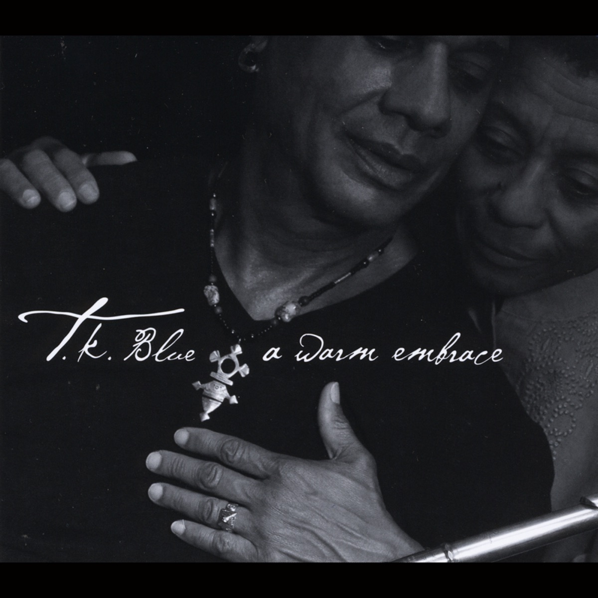 A Warm Embrace by T.K. Blue album cover