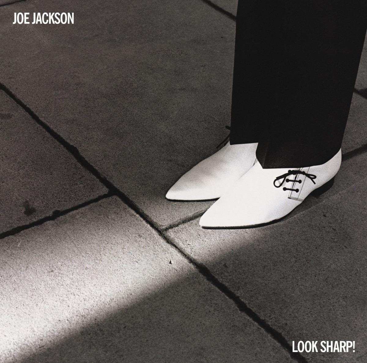 Look Sharp! (Bonus Track Version) by Joe Jackson album cover