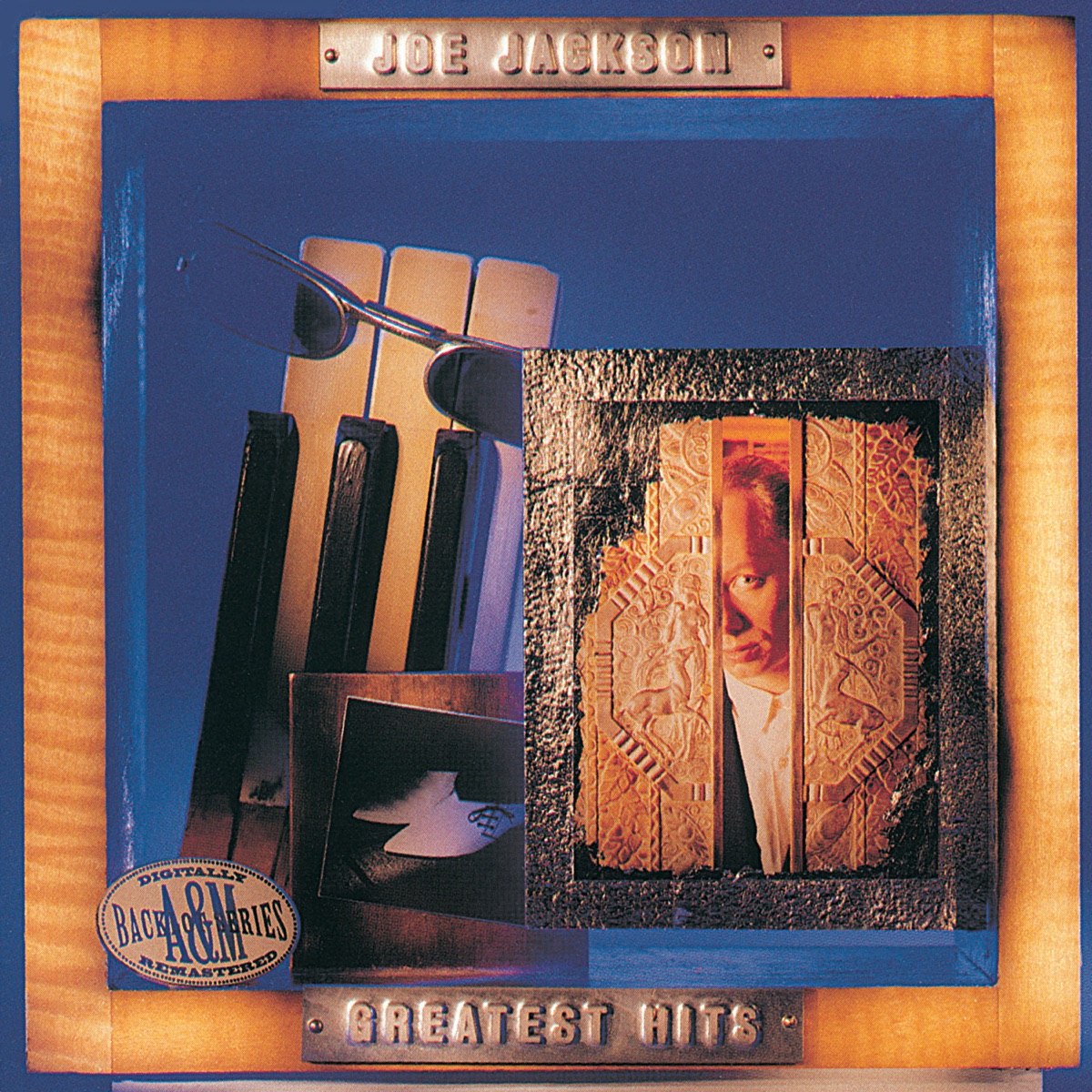 Greatest Hits (Remastered) by Joe Jackson album cover