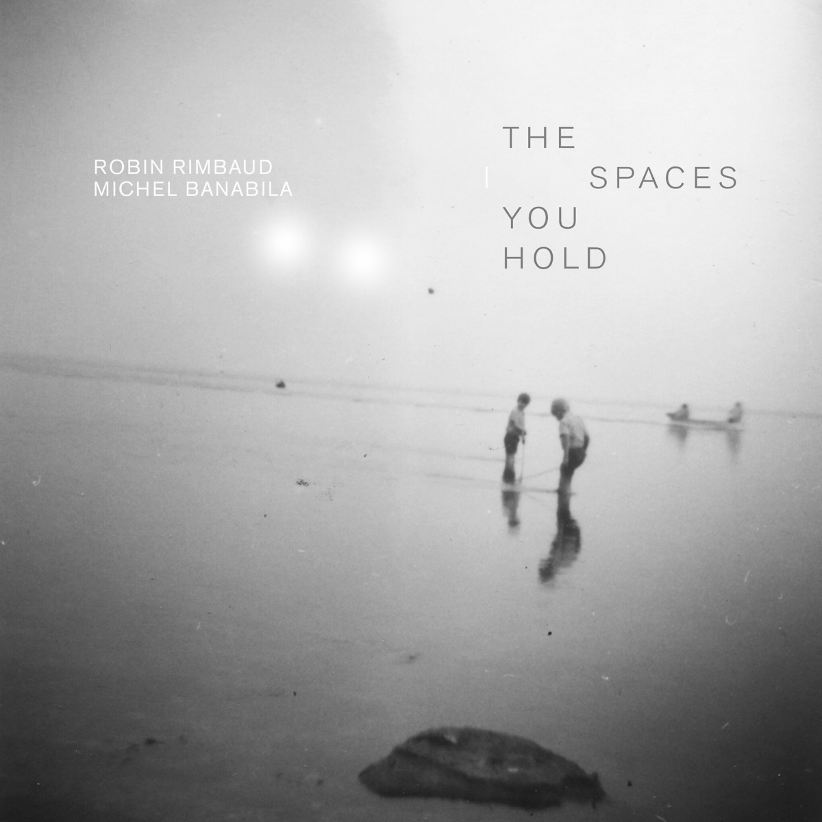 The Spaces You Hold - EP by Robin Rimbaud & Michel Banabila album cover