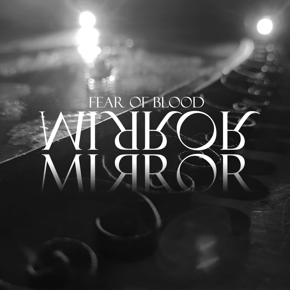The Mirror Which Flatters Not - Single by Fear of Blood album cover