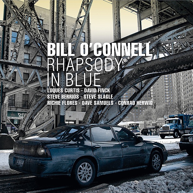 Rhapsody in Blue by Bill O'Connell, Luques Curtis, David Finck, Steve Berrios, Steve Slaggle, Richie Flores, Dave Samuels & Conrad Herwig album cover
