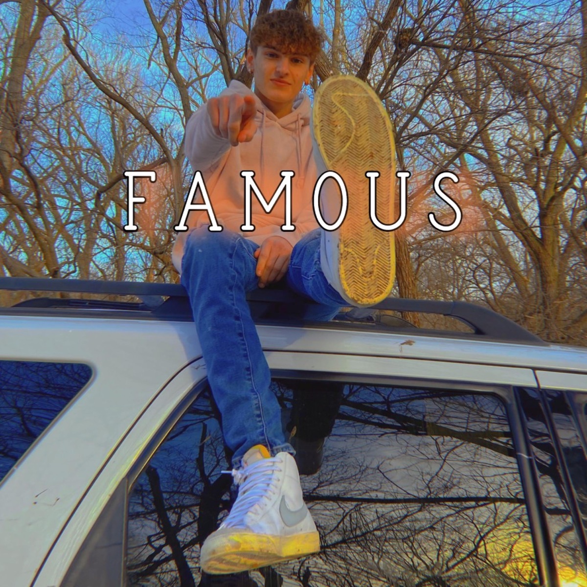 Famous - Single by K Sto album cover