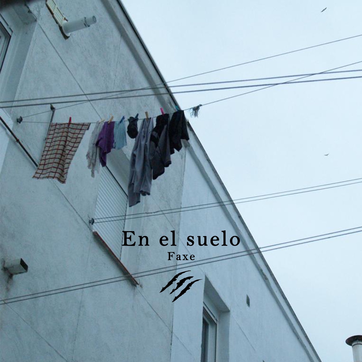 En el suelo - Single by Faxe & Triple Filo album cover