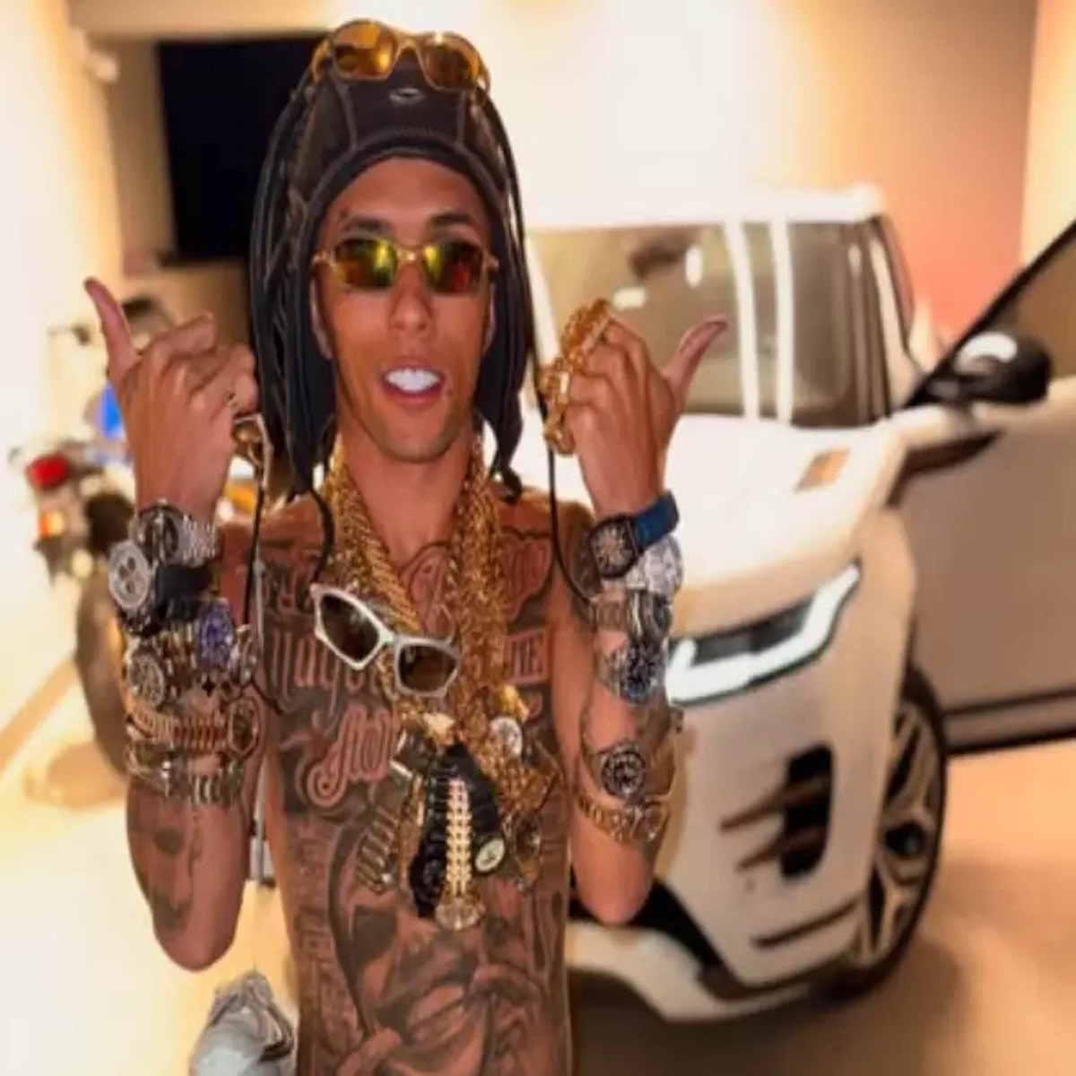 TROPA DO BUZEIRA PASSA TOMANDO ROLEX - Single by Juninho Talibã album cover
