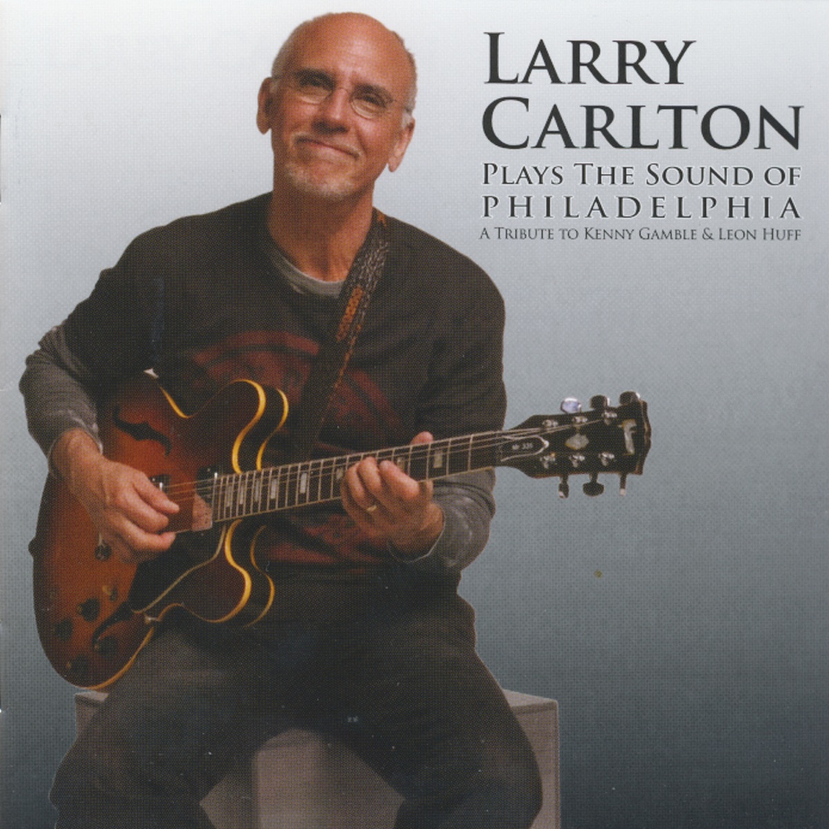 Plays The Sound Of Philadelphia by Larry Carlton album cover