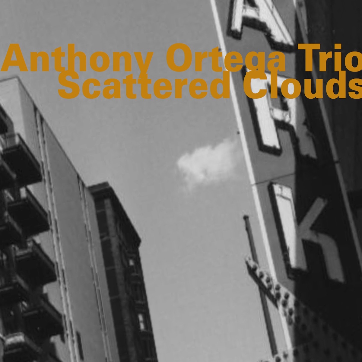 Scattered Clouds (feat. Anthony Ortega, Mike Wofford & Joe LaBarbera) by Anthony Ortega Trio album cover